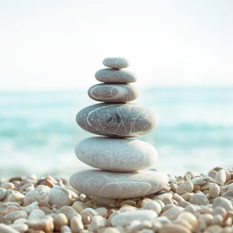 stacked rocks on beach